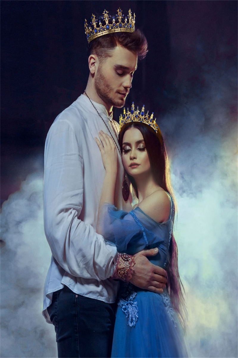 A man and a beautiful woman are hugging in the smoke, with their eyes closed.